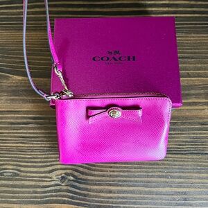 Fuchsia Coach Wristlet with Bow Accent